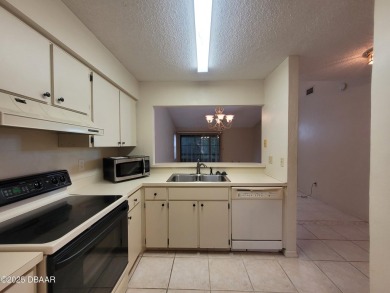 Located in the ST. ANDREWS section of Pelican Bay. Brick on The Club At Pelican Bay - North Course in Florida - for sale on GolfHomes.com, golf home, golf lot