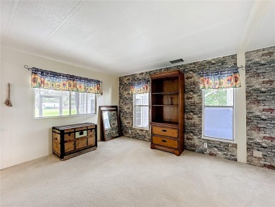 Location is everything and this home has it! Sit on one of the on Zellwood Station Country Club in Florida - for sale on GolfHomes.com, golf home, golf lot