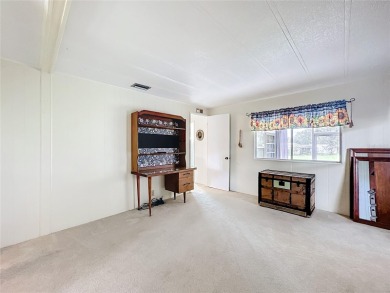 Location is everything and this home has it! Sit on one of the on Zellwood Station Country Club in Florida - for sale on GolfHomes.com, golf home, golf lot