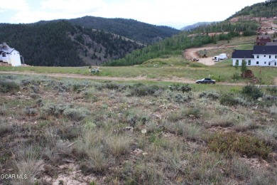 Slightly sloping uphill lot, views of Granby Ranch resort runs on Headwaters Golf Course At Granby Ranch in Colorado - for sale on GolfHomes.com, golf home, golf lot