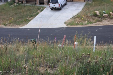 Slightly sloping uphill lot, views of Granby Ranch resort runs on Headwaters Golf Course At Granby Ranch in Colorado - for sale on GolfHomes.com, golf home, golf lot