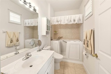 Experience the highly sought-after Key West model in Providence on Naples Lakes Country Club in Florida - for sale on GolfHomes.com, golf home, golf lot