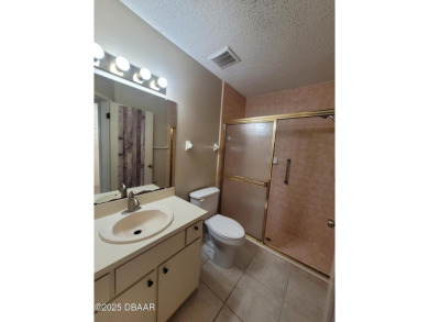 Located in the ST. ANDREWS section of Pelican Bay. Brick on The Club At Pelican Bay - North Course in Florida - for sale on GolfHomes.com, golf home, golf lot