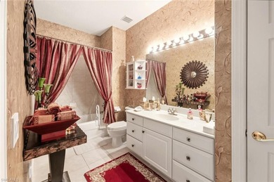 Experience the highly sought-after Key West model in Providence on Naples Lakes Country Club in Florida - for sale on GolfHomes.com, golf home, golf lot