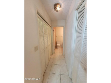 Located in the ST. ANDREWS section of Pelican Bay. Brick on The Club At Pelican Bay - North Course in Florida - for sale on GolfHomes.com, golf home, golf lot