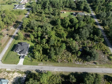 Great Investment! .5 Acre Almost Cleared Lot on Paved Road in on Lehigh Resort Club in Florida - for sale on GolfHomes.com, golf home, golf lot