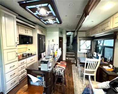 A luxury RV on a lot with a fantastic view and complete on Rancho California RV Resort in California - for sale on GolfHomes.com, golf home, golf lot