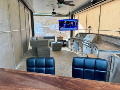 A luxury RV on a lot with a fantastic view and complete on Rancho California RV Resort in California - for sale on GolfHomes.com, golf home, golf lot