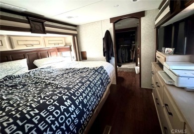 A luxury RV on a lot with a fantastic view and complete on Rancho California RV Resort in California - for sale on GolfHomes.com, golf home, golf lot