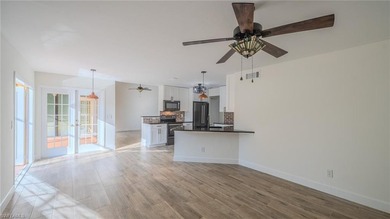 NEW ROOF 2023, NEW PLUMBING 2026, POOL CAGE 2023, HURRICANE on Fountain Lakes Community Golf Course in Florida - for sale on GolfHomes.com, golf home, golf lot