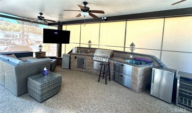 A luxury RV on a lot with a fantastic view and complete on Rancho California RV Resort in California - for sale on GolfHomes.com, golf home, golf lot