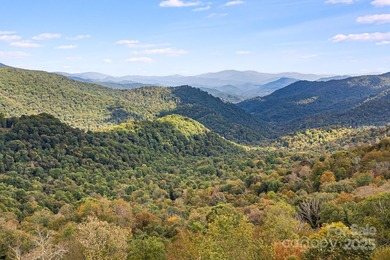 Mountain view homesite, now triple the size. This combined 3-lot on Wolf Laurel Country Club in North Carolina - for sale on GolfHomes.com, golf home, golf lot