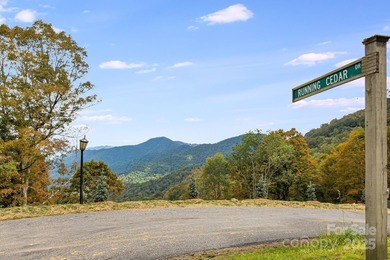 Mountain view homesite, now triple the size. This combined 3-lot on Wolf Laurel Country Club in North Carolina - for sale on GolfHomes.com, golf home, golf lot