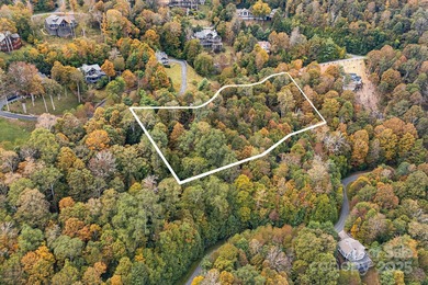 Mountain view homesite, now triple the size. This combined 3-lot on Wolf Laurel Country Club in North Carolina - for sale on GolfHomes.com, golf home, golf lot