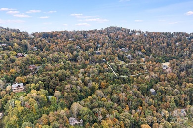 Mountain view homesite, now triple the size. This combined 3-lot on Wolf Laurel Country Club in North Carolina - for sale on GolfHomes.com, golf home, golf lot