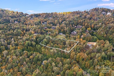 Mountain view homesite, now triple the size. This combined 3-lot on Wolf Laurel Country Club in North Carolina - for sale on GolfHomes.com, golf home, golf lot