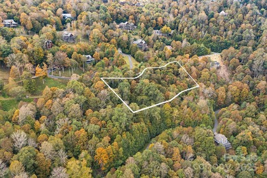 Mountain view homesite, now triple the size. This combined 3-lot on Wolf Laurel Country Club in North Carolina - for sale on GolfHomes.com, golf home, golf lot