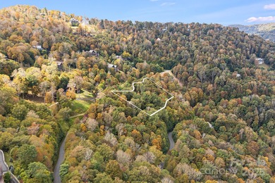 Mountain view homesite, now triple the size. This combined 3-lot on Wolf Laurel Country Club in North Carolina - for sale on GolfHomes.com, golf home, golf lot