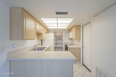Located in beautiful guard gated 55+ community, this 1974, 1,164 on Leisure World Country Club in Arizona - for sale on GolfHomes.com, golf home, golf lot