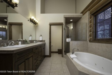 This beautifully maintained 4-bedroom, 4.5-bath log cabin in on Teton Springs Resort and Club in Idaho - for sale on GolfHomes.com, golf home, golf lot