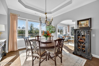 Exquisite home with a view of the pond located in the on Cape Fear National At Brunswick Forest in North Carolina - for sale on GolfHomes.com, golf home, golf lot