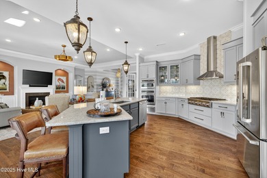 Exquisite home with a view of the pond located in the on Cape Fear National At Brunswick Forest in North Carolina - for sale on GolfHomes.com, golf home, golf lot