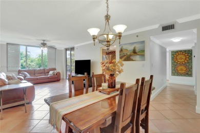 This exceptional corner unit comes with 2 cover parking spaces on Greynolds Park Golf Course in Florida - for sale on GolfHomes.com, golf home, golf lot