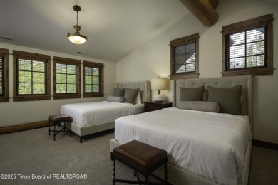 This beautifully maintained 4-bedroom, 4.5-bath log cabin in on Teton Springs Resort and Club in Idaho - for sale on GolfHomes.com, golf home, golf lot