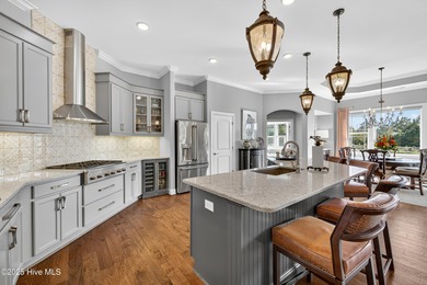 Exquisite home with a view of the pond located in the on Cape Fear National At Brunswick Forest in North Carolina - for sale on GolfHomes.com, golf home, golf lot