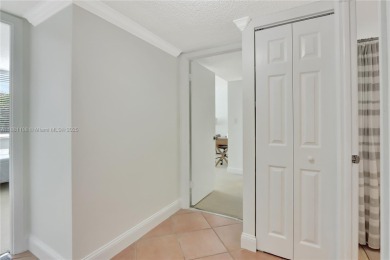 This exceptional corner unit comes with 2 cover parking spaces on Greynolds Park Golf Course in Florida - for sale on GolfHomes.com, golf home, golf lot