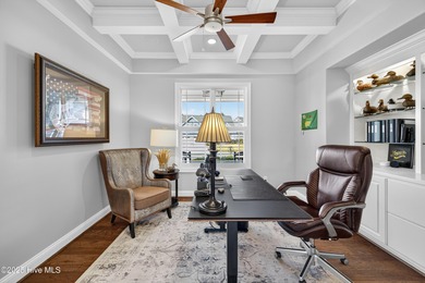 Exquisite home with a view of the pond located in the on Cape Fear National At Brunswick Forest in North Carolina - for sale on GolfHomes.com, golf home, golf lot