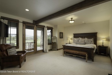 This beautifully maintained 4-bedroom, 4.5-bath log cabin in on Teton Springs Resort and Club in Idaho - for sale on GolfHomes.com, golf home, golf lot