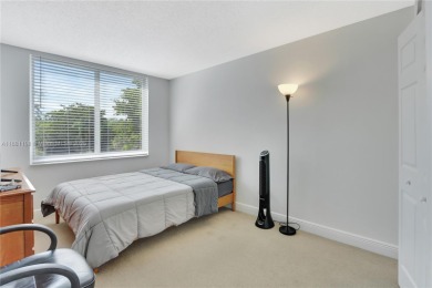 This exceptional corner unit comes with 2 cover parking spaces on Greynolds Park Golf Course in Florida - for sale on GolfHomes.com, golf home, golf lot