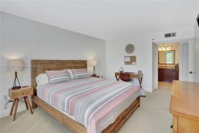 This exceptional corner unit comes with 2 cover parking spaces on Greynolds Park Golf Course in Florida - for sale on GolfHomes.com, golf home, golf lot