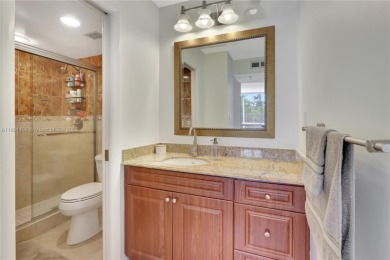 This exceptional corner unit comes with 2 cover parking spaces on Greynolds Park Golf Course in Florida - for sale on GolfHomes.com, golf home, golf lot