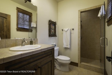 This beautifully maintained 4-bedroom, 4.5-bath log cabin in on Teton Springs Resort and Club in Idaho - for sale on GolfHomes.com, golf home, golf lot