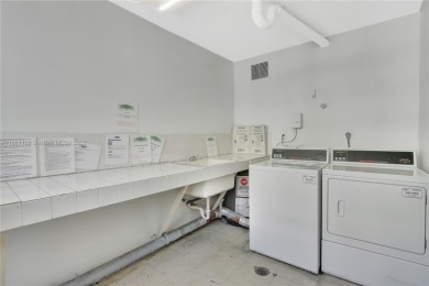 This exceptional corner unit comes with 2 cover parking spaces on Greynolds Park Golf Course in Florida - for sale on GolfHomes.com, golf home, golf lot