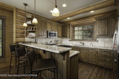 This beautifully maintained 4-bedroom, 4.5-bath log cabin in on Teton Springs Resort and Club in Idaho - for sale on GolfHomes.com, golf home, golf lot