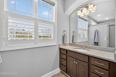 Exquisite home with a view of the pond located in the on Cape Fear National At Brunswick Forest in North Carolina - for sale on GolfHomes.com, golf home, golf lot