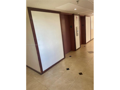 This exceptional corner unit comes with 2 cover parking spaces on Greynolds Park Golf Course in Florida - for sale on GolfHomes.com, golf home, golf lot