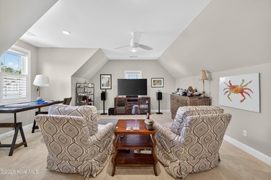 Exquisite home with a view of the pond located in the on Cape Fear National At Brunswick Forest in North Carolina - for sale on GolfHomes.com, golf home, golf lot