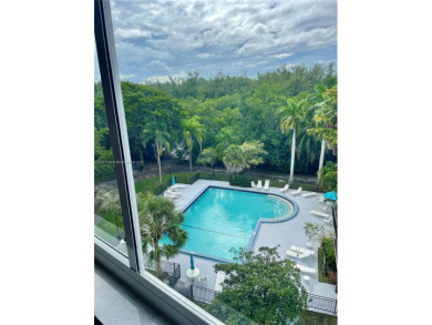 This exceptional corner unit comes with 2 cover parking spaces on Greynolds Park Golf Course in Florida - for sale on GolfHomes.com, golf home, golf lot