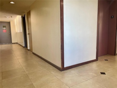 This exceptional corner unit comes with 2 cover parking spaces on Greynolds Park Golf Course in Florida - for sale on GolfHomes.com, golf home, golf lot