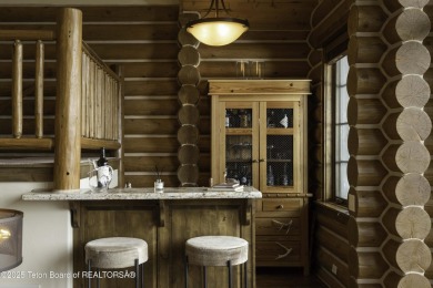 This beautifully maintained 4-bedroom, 4.5-bath log cabin in on Teton Springs Resort and Club in Idaho - for sale on GolfHomes.com, golf home, golf lot
