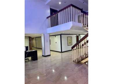 This exceptional corner unit comes with 2 cover parking spaces on Greynolds Park Golf Course in Florida - for sale on GolfHomes.com, golf home, golf lot