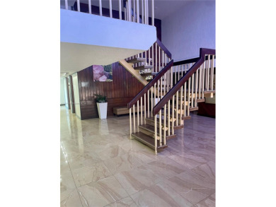 This exceptional corner unit comes with 2 cover parking spaces on Greynolds Park Golf Course in Florida - for sale on GolfHomes.com, golf home, golf lot