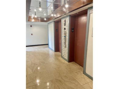 This exceptional corner unit comes with 2 cover parking spaces on Greynolds Park Golf Course in Florida - for sale on GolfHomes.com, golf home, golf lot