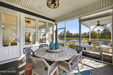Exquisite home with a view of the pond located in the on Cape Fear National At Brunswick Forest in North Carolina - for sale on GolfHomes.com, golf home, golf lot