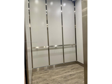 This exceptional corner unit comes with 2 cover parking spaces on Greynolds Park Golf Course in Florida - for sale on GolfHomes.com, golf home, golf lot