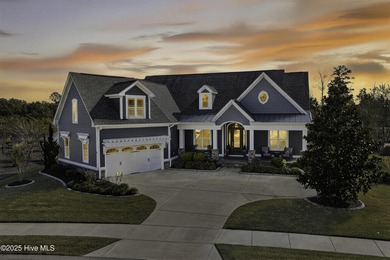 Exquisite home with a view of the pond located in the on Cape Fear National At Brunswick Forest in North Carolina - for sale on GolfHomes.com, golf home, golf lot